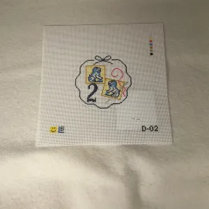 * Lauren Bloch  D02- 12 Days of Needlepoint- Two Foo Dog Needle Minders