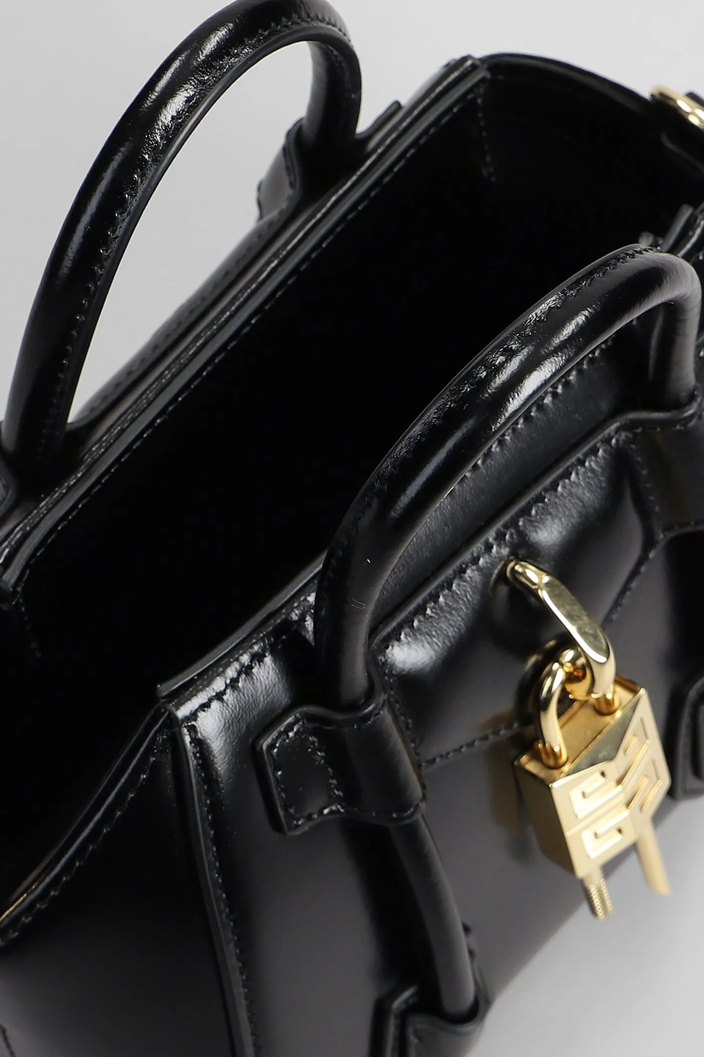 Antigona lock toy Shoulder bag in black leather