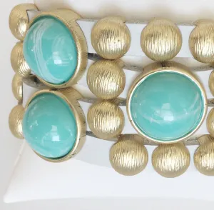 Bursting Goldtone Beads and Turquoise Resin Accents Adorn this White Leather Bracelet with Magnetic Clasp