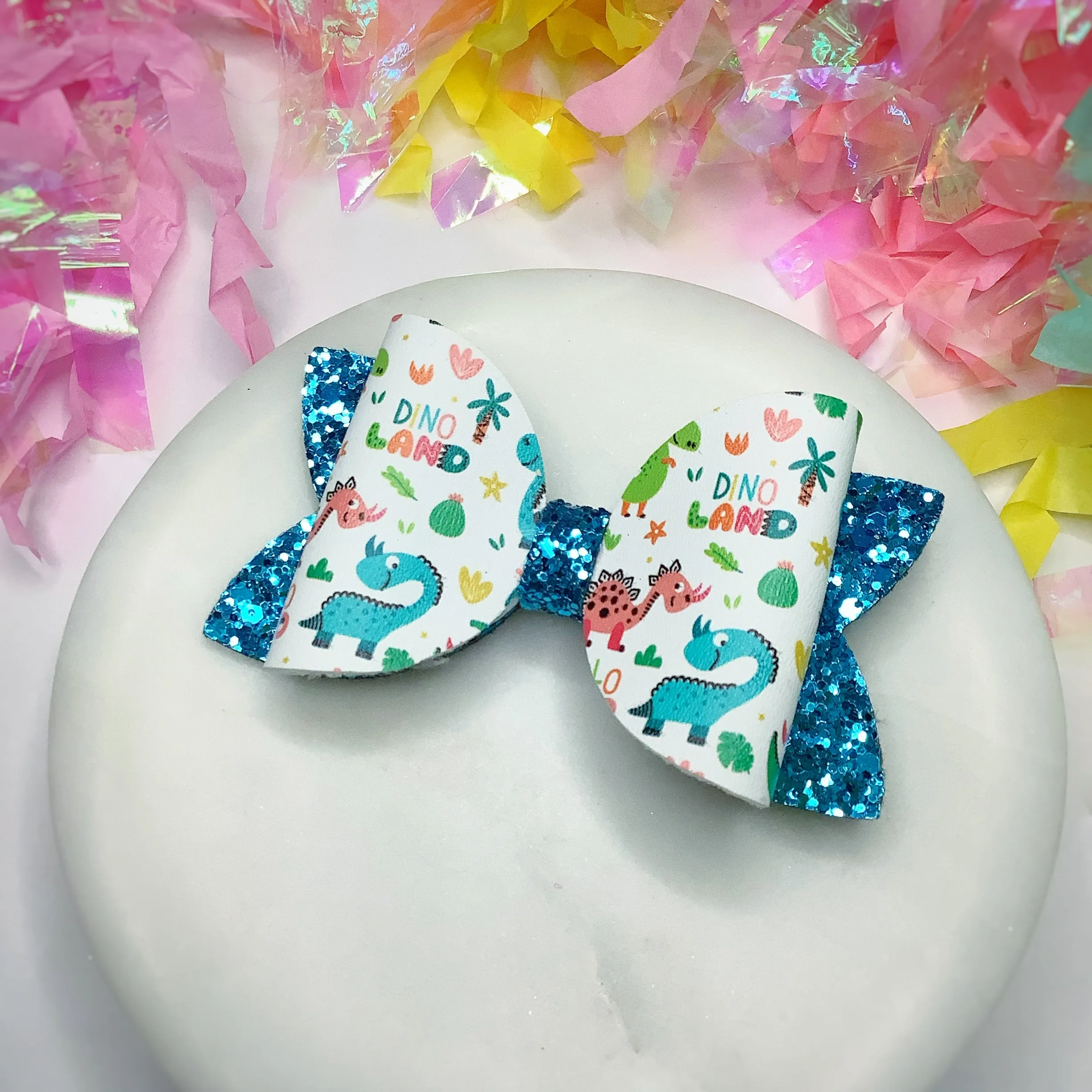 Hello Dino Riley Bow and 3.5” Faux Leather Bow Collection