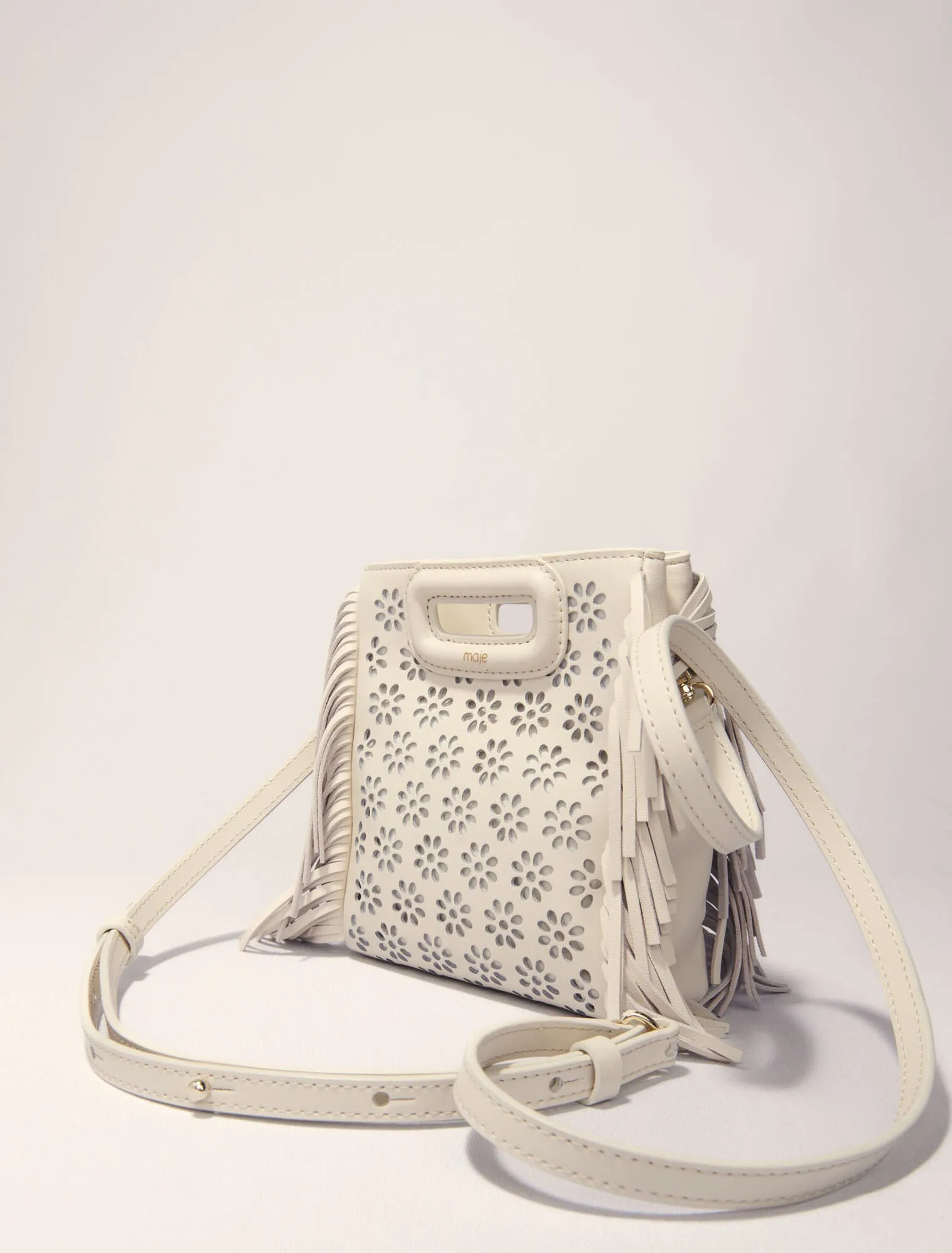 Perforated leather mini m bag