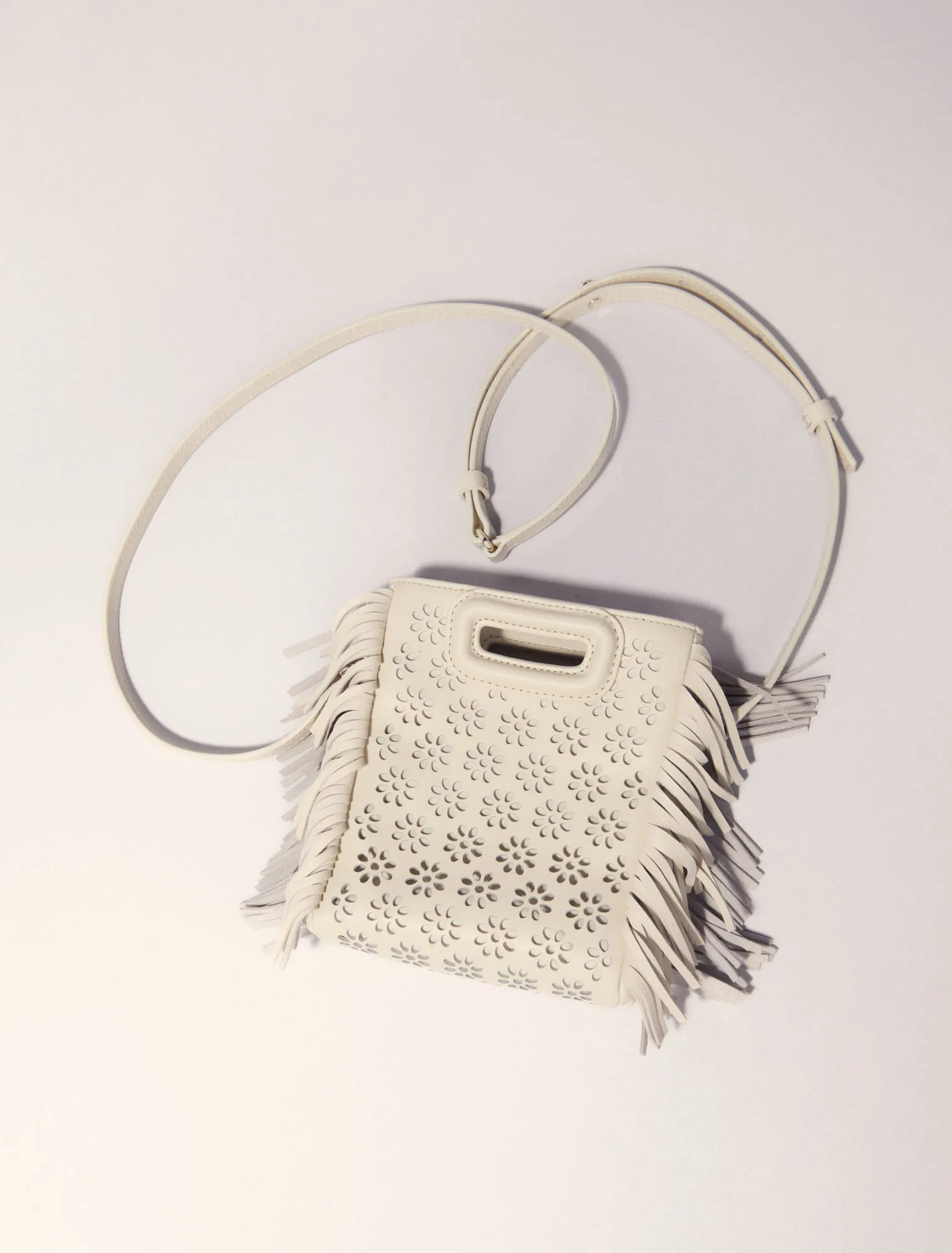 Perforated leather mini m bag