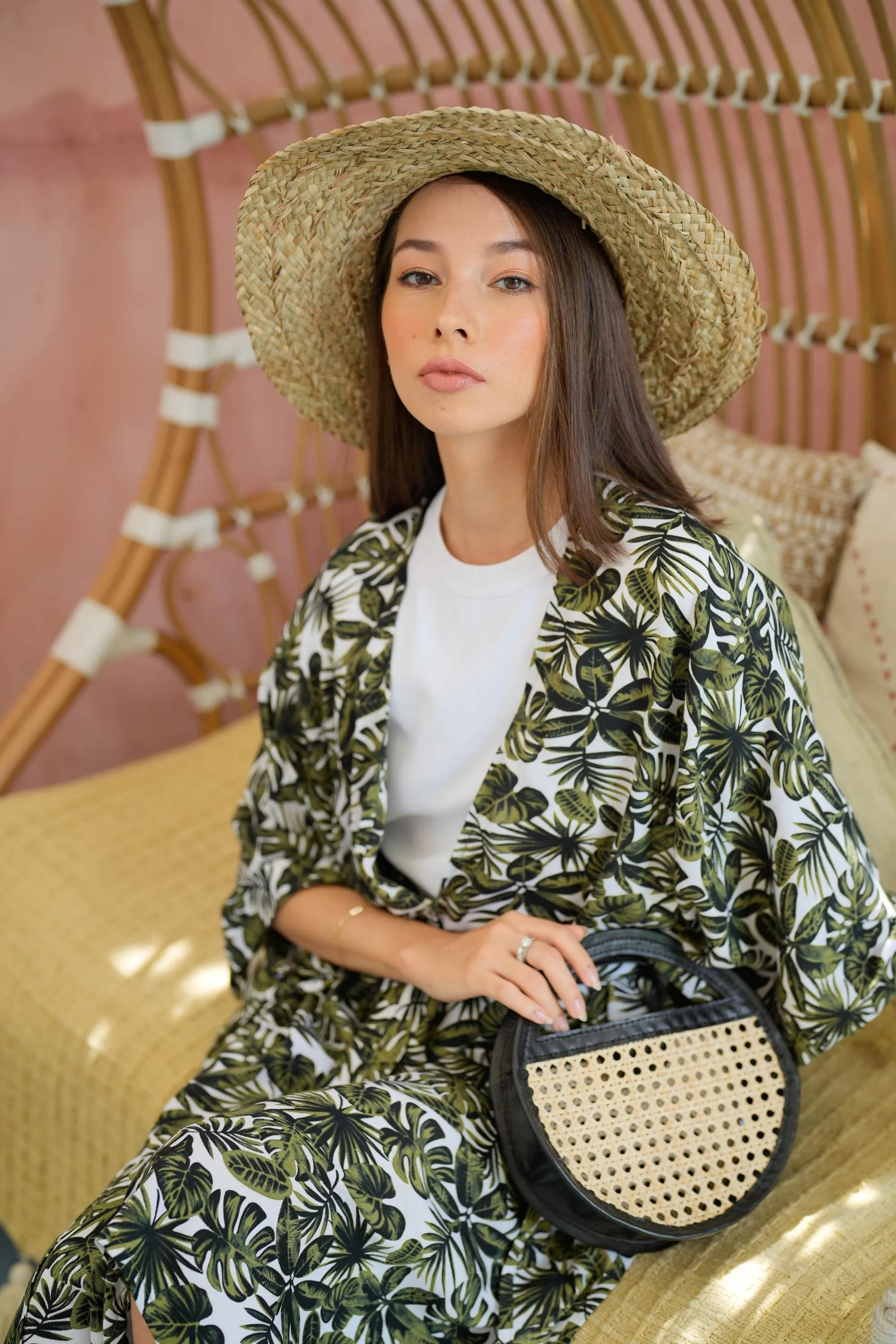 Sage Cane and Leather Mini Round Clutch Crossbody in Black