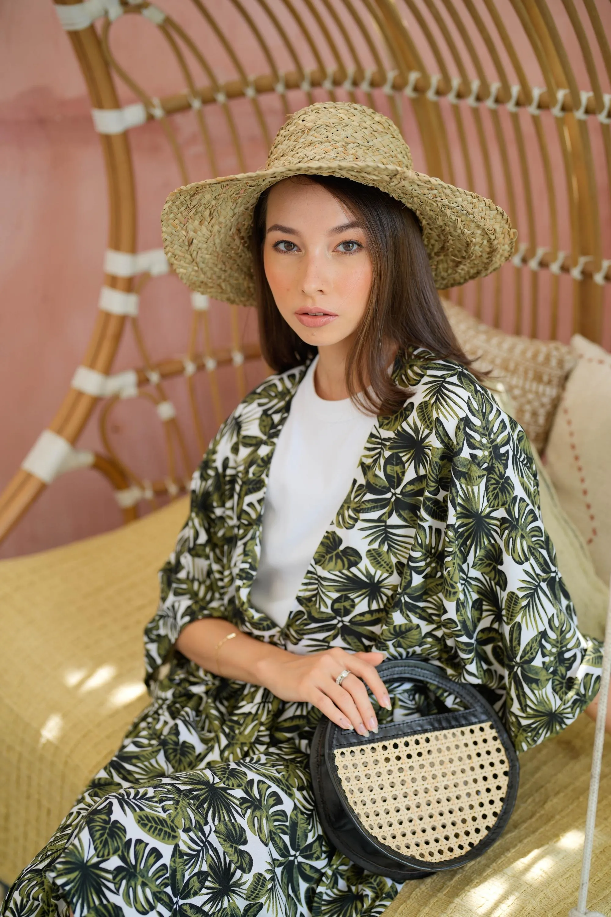 Sage Cane and Leather Mini Round Clutch Crossbody in Black