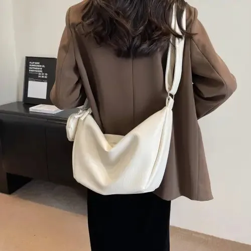 Stylish Leather Crossbody Bag with Earbud Case and Small Purse
