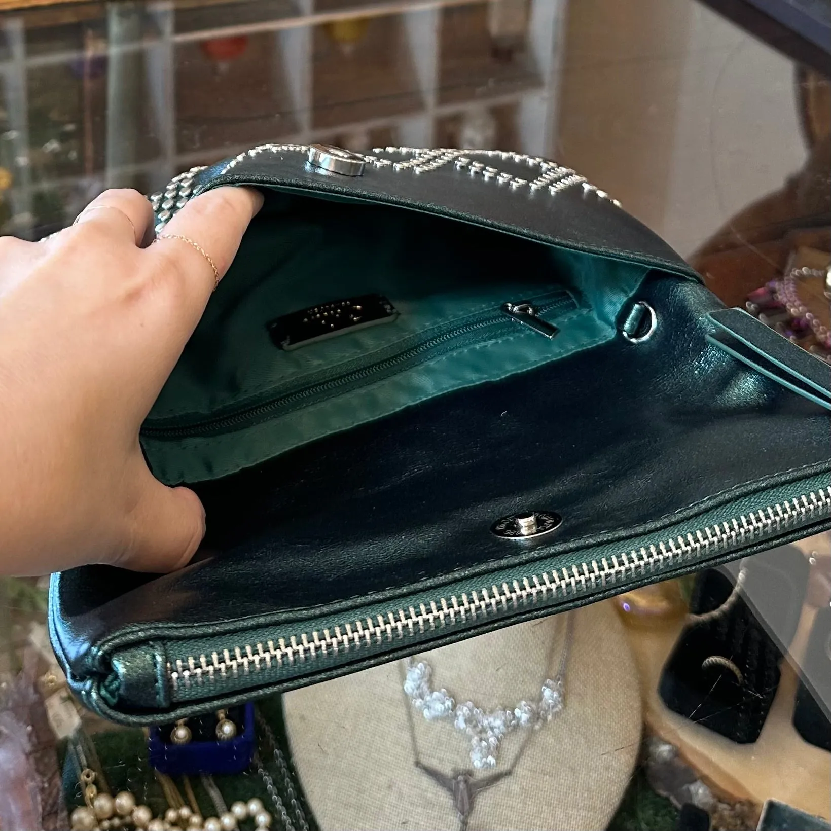 The EMERALD CITY Clutch in Metallic Green