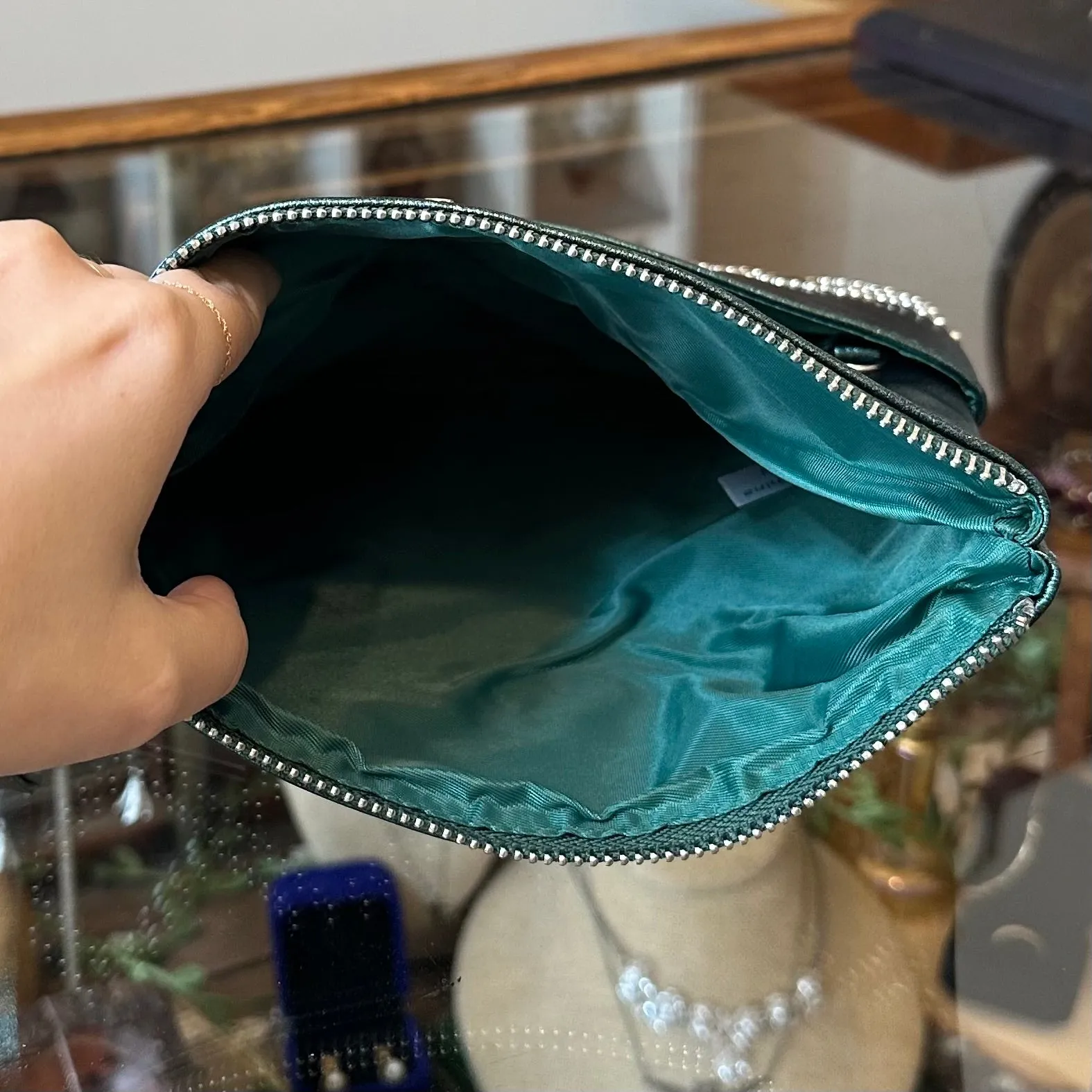 The EMERALD CITY Clutch in Metallic Green