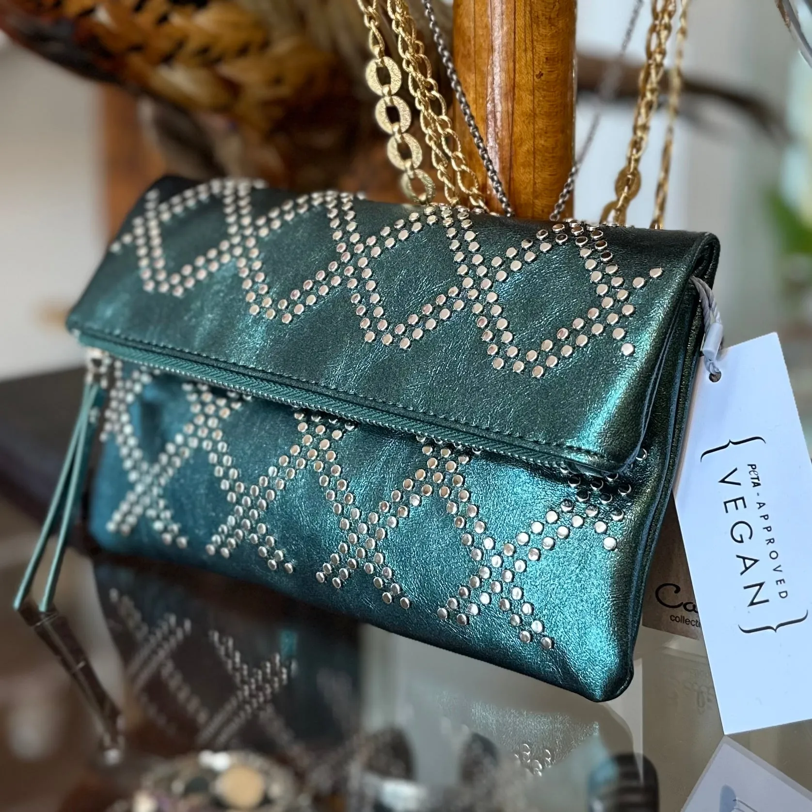 The EMERALD CITY Clutch in Metallic Green