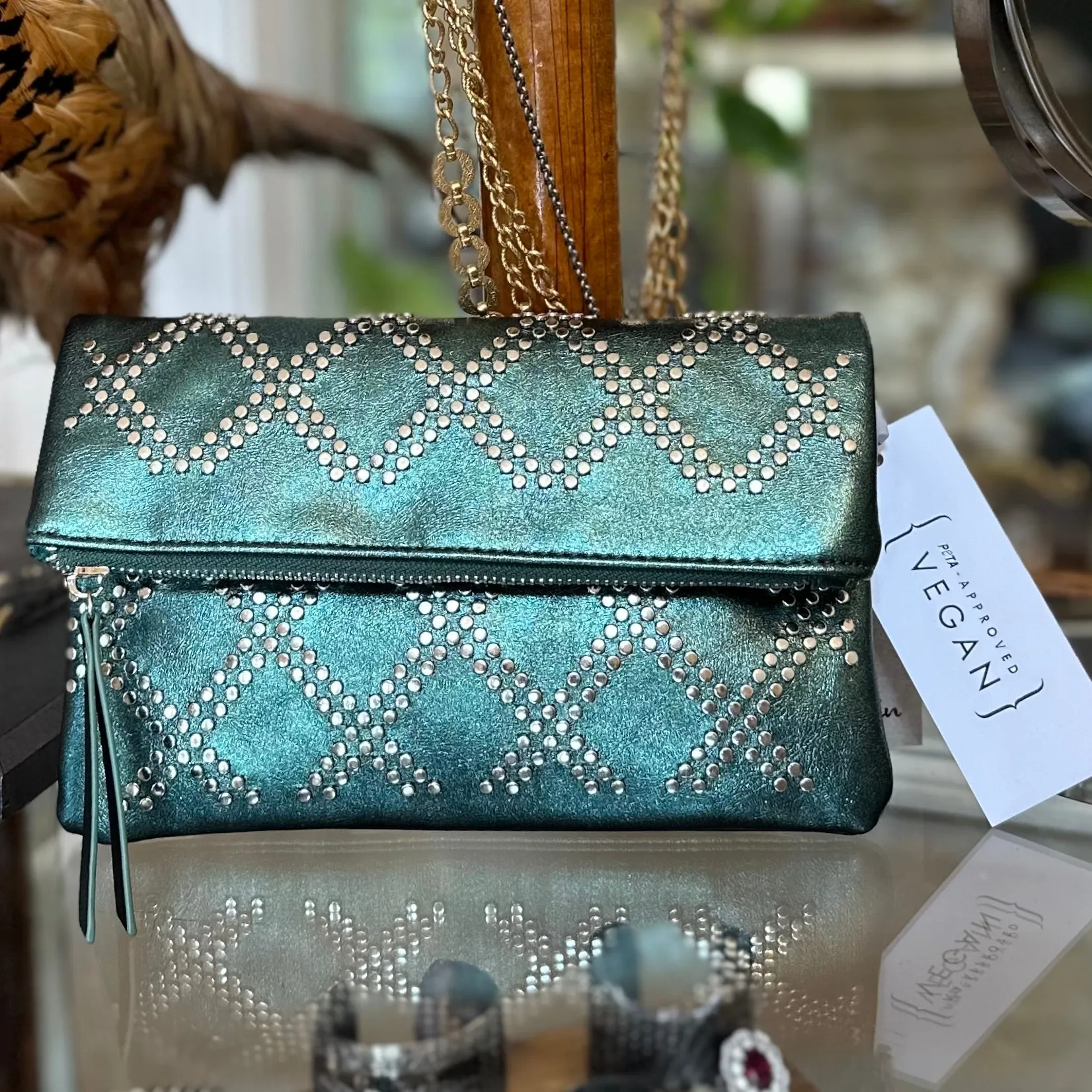 The EMERALD CITY Clutch in Metallic Green