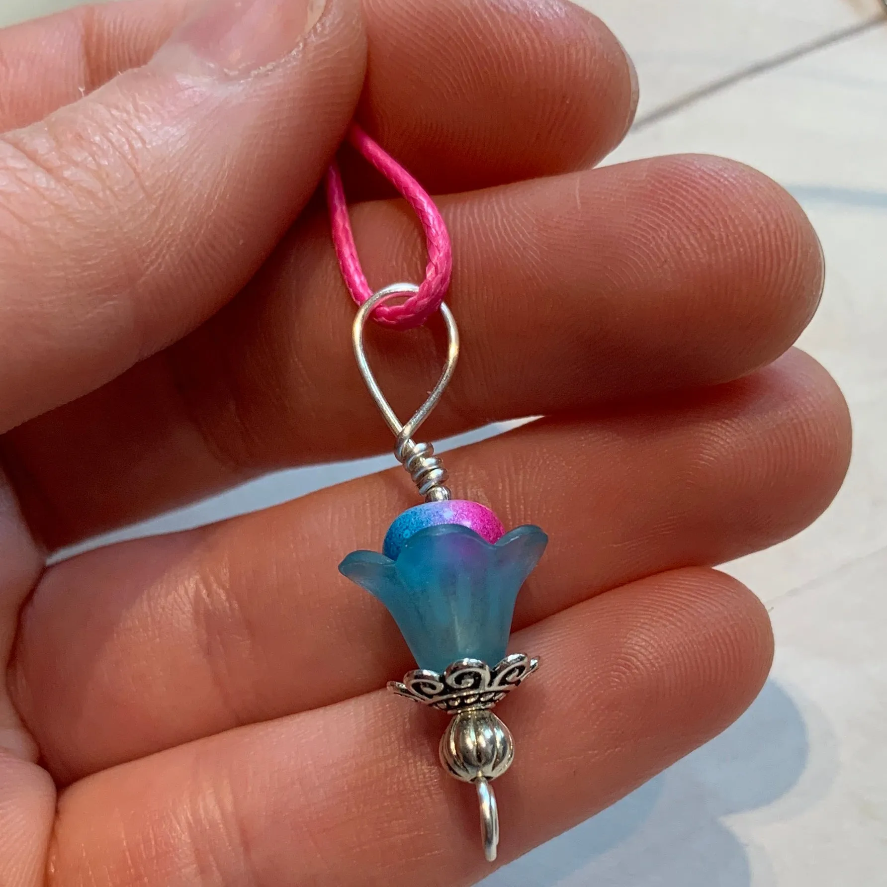 Tiny Evil Genius Pendant: blue flower