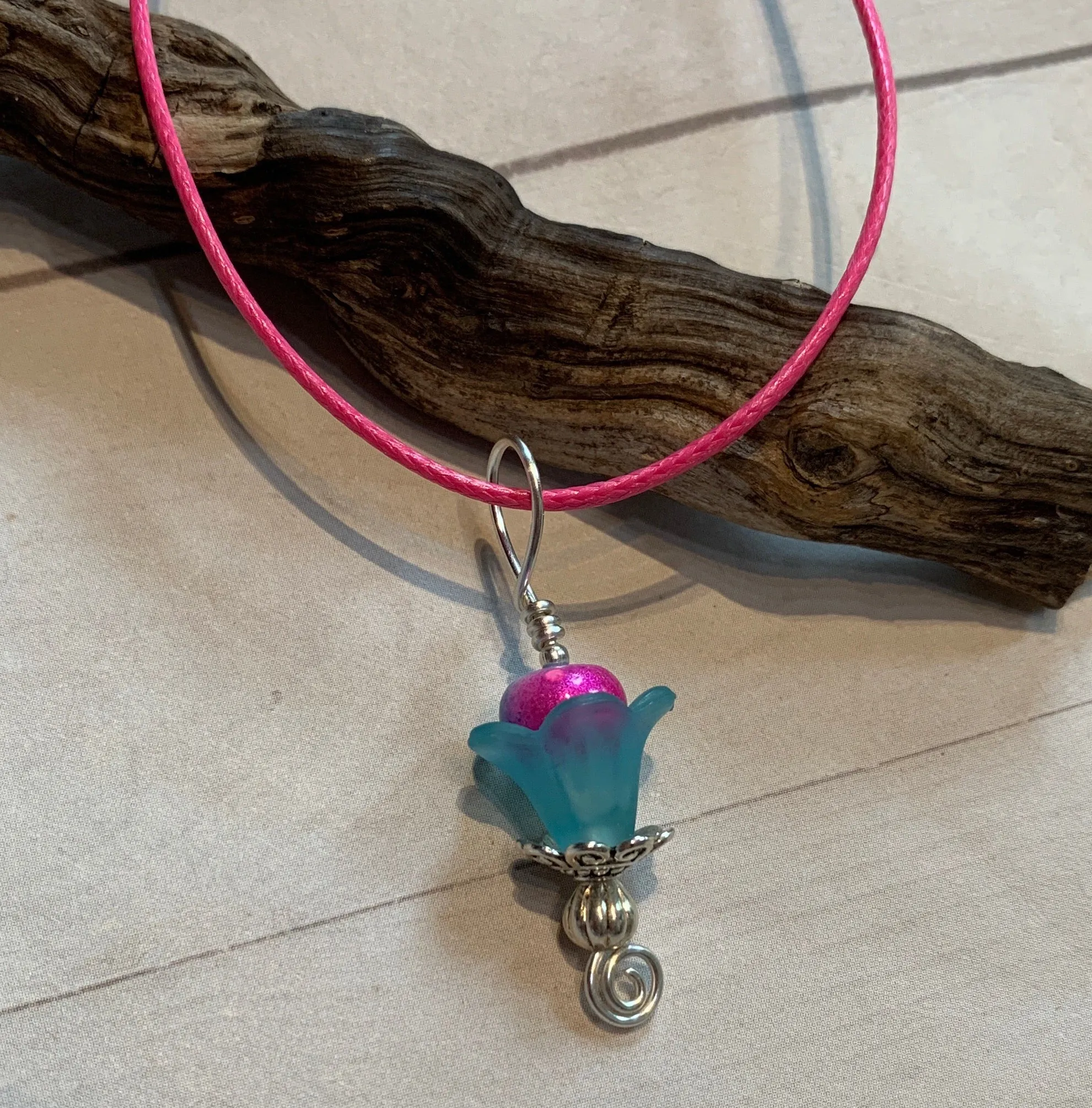 Tiny Evil Genius Pendant: blue flower