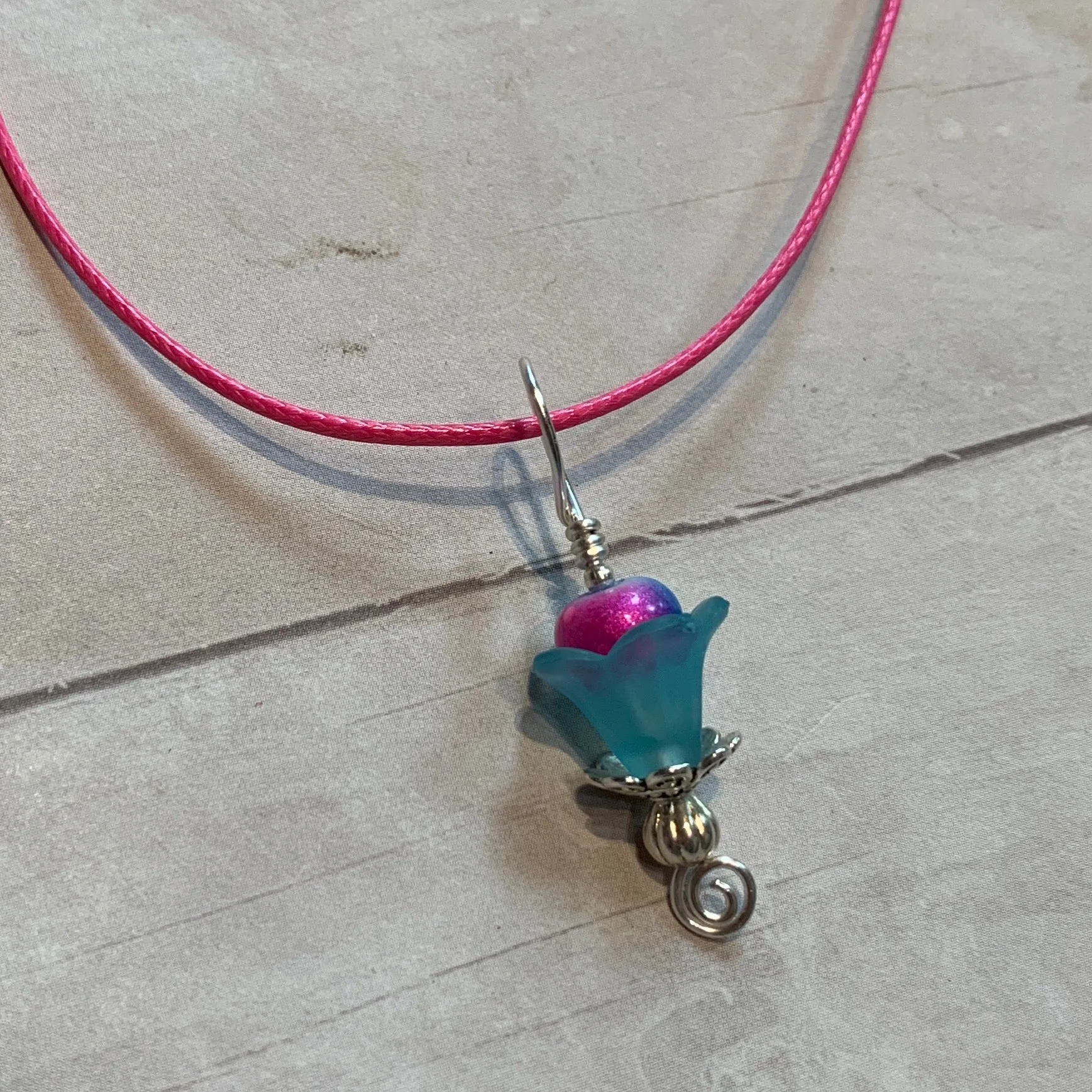 Tiny Evil Genius Pendant: blue flower