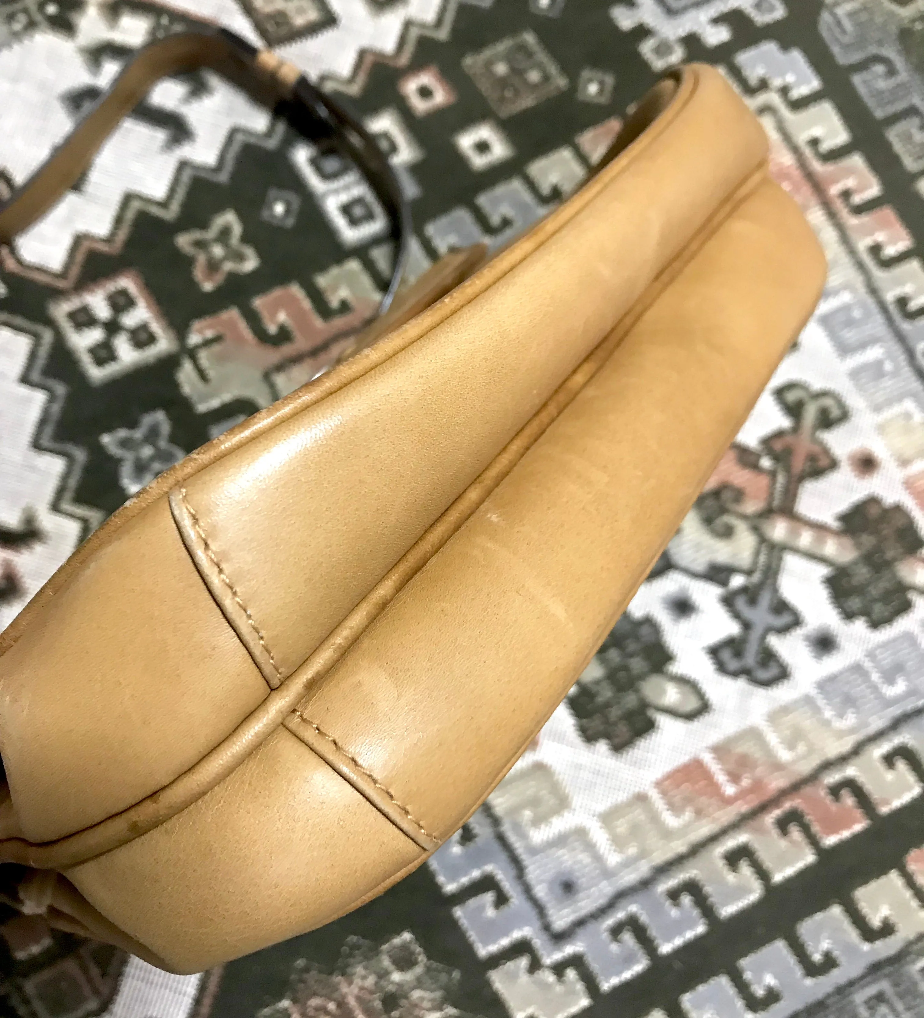 Vintage Gucci nude brown leather shoulder bag with golden and silver tone GG logo motif and wavy design flap. Classic purse. 060716r